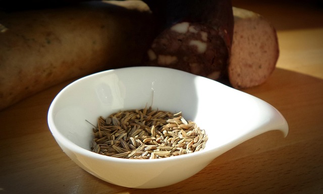 caraway seeds in a white bowl